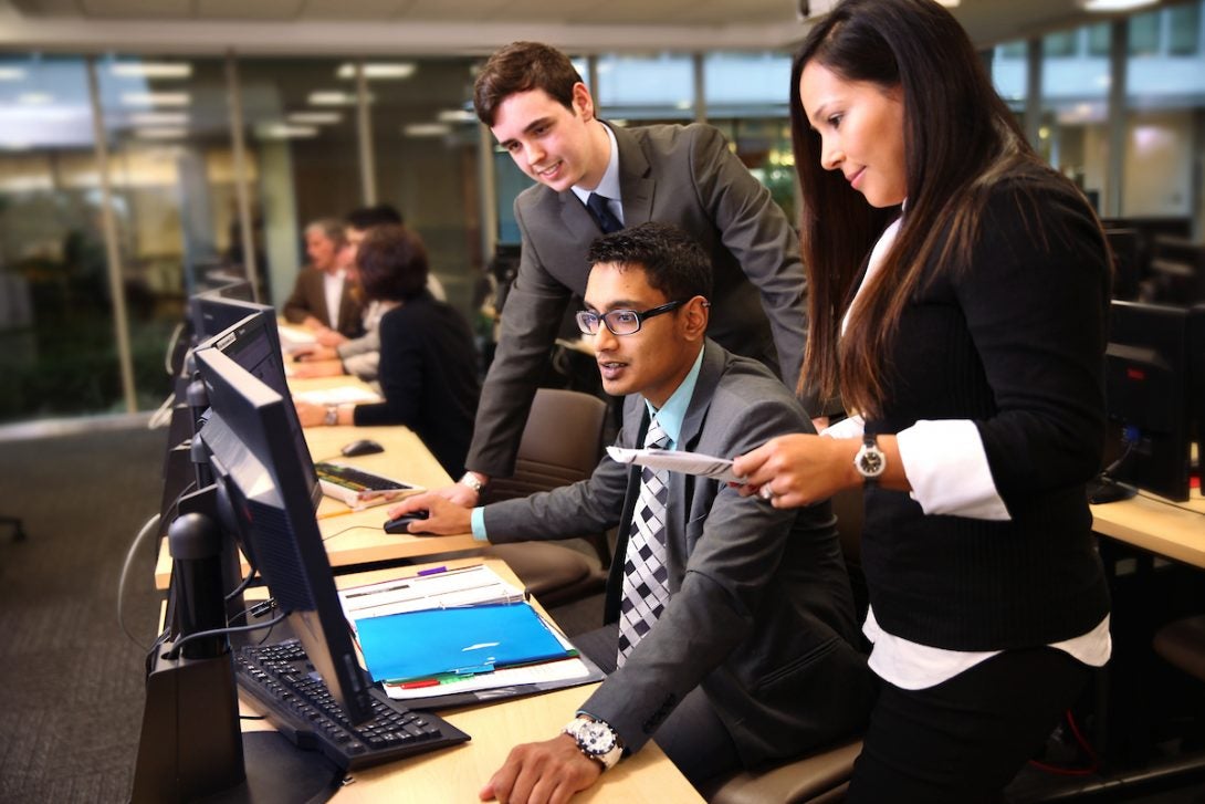 Students working together on a computer