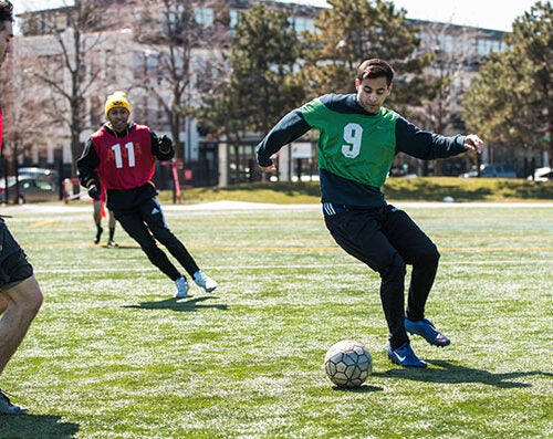 students playing soccer